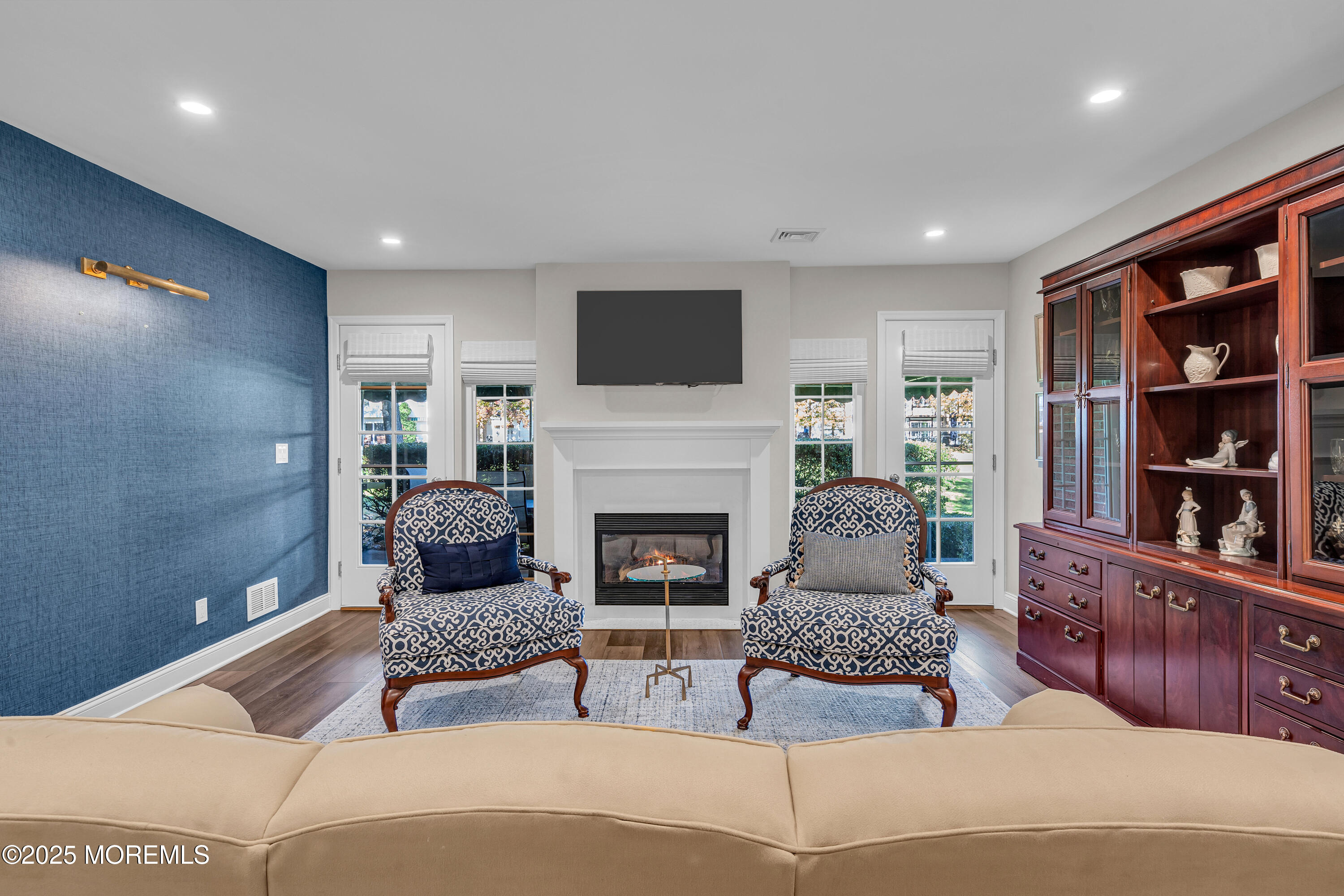 68 Maple Drive Spring Lake Heights, NJ 07762 - Photo 12 of 24 a living room with furniture and a fireplace