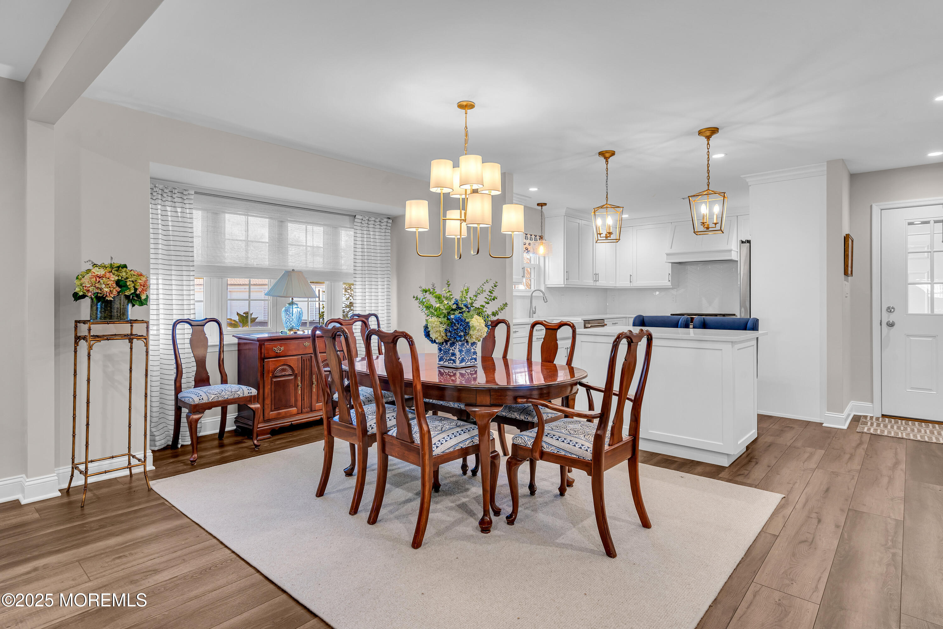 68 Maple Drive Spring Lake Heights, NJ 07762 - Photo 10 of 24 a view of a dining room with furniture and chandelier