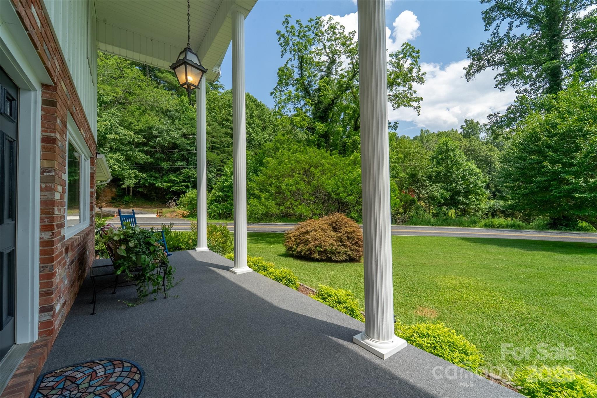a garden view with a seating space