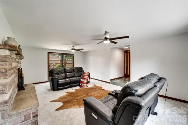 a living room with furniture and a couch
