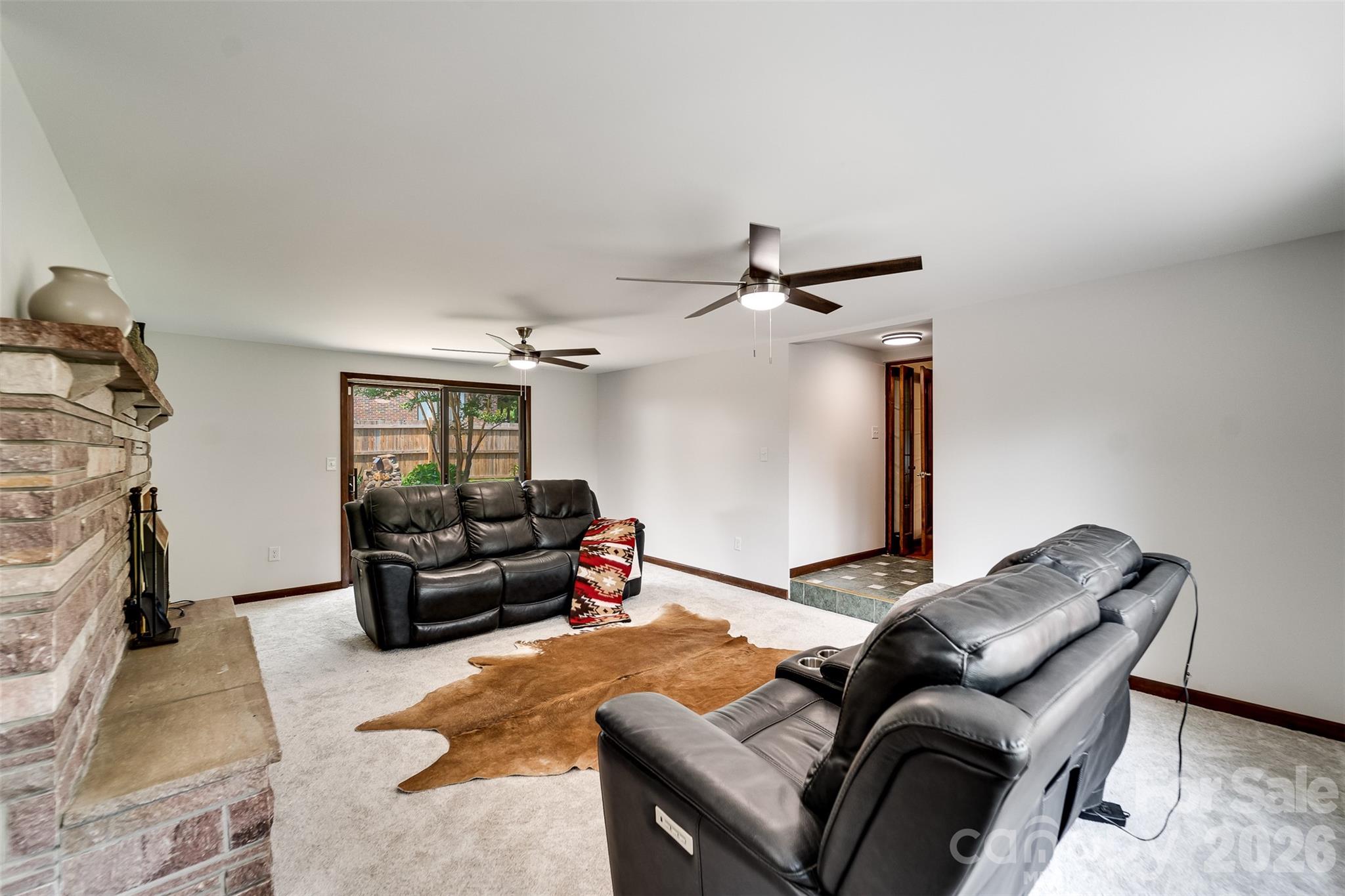181 Fisher Crk Road Sylva, NC 28779 - Photo 18 of 48 a living room with furniture and a couch