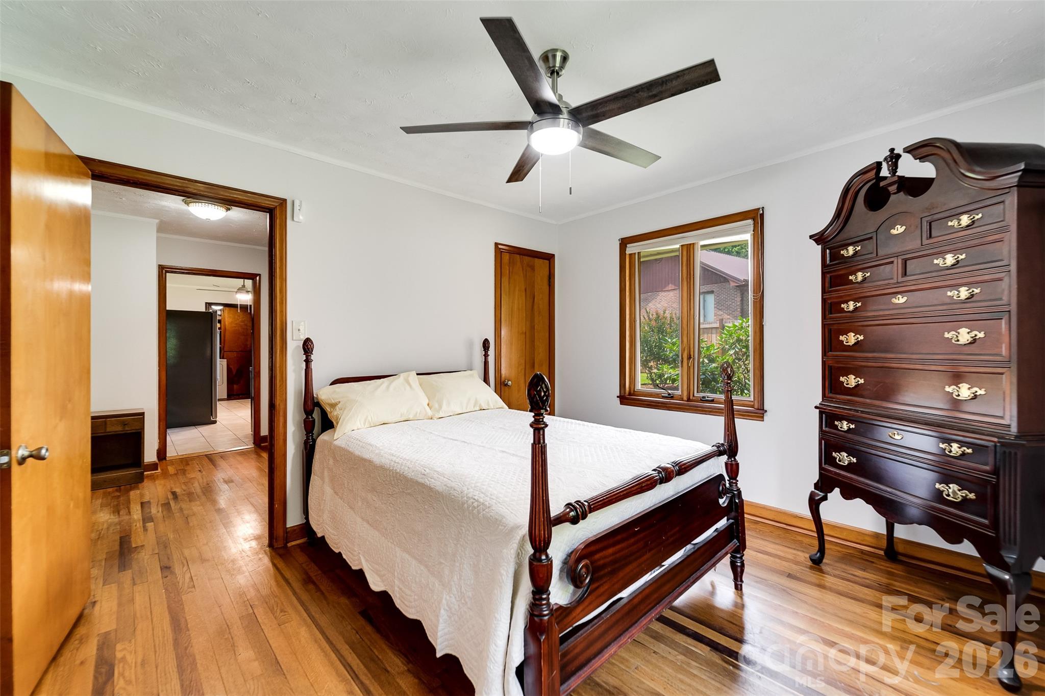 181 Fisher Crk Road Sylva, NC 28779 - Photo 21 of 48 a bed sitting in a bedroom next to a window