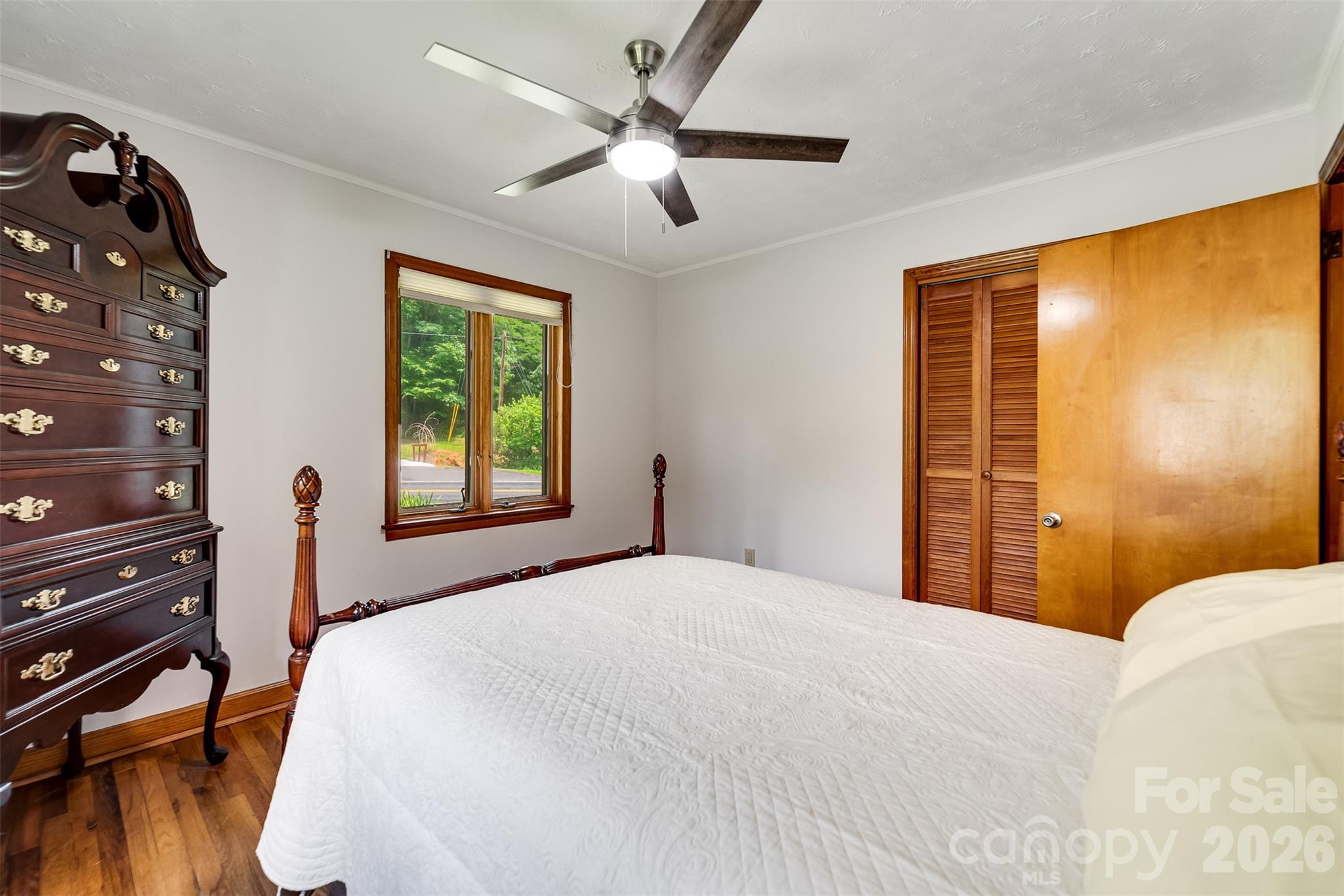 181 Fisher Crk Road Sylva, NC 28779 - Photo 22 of 48 a bedroom with a bed and a table