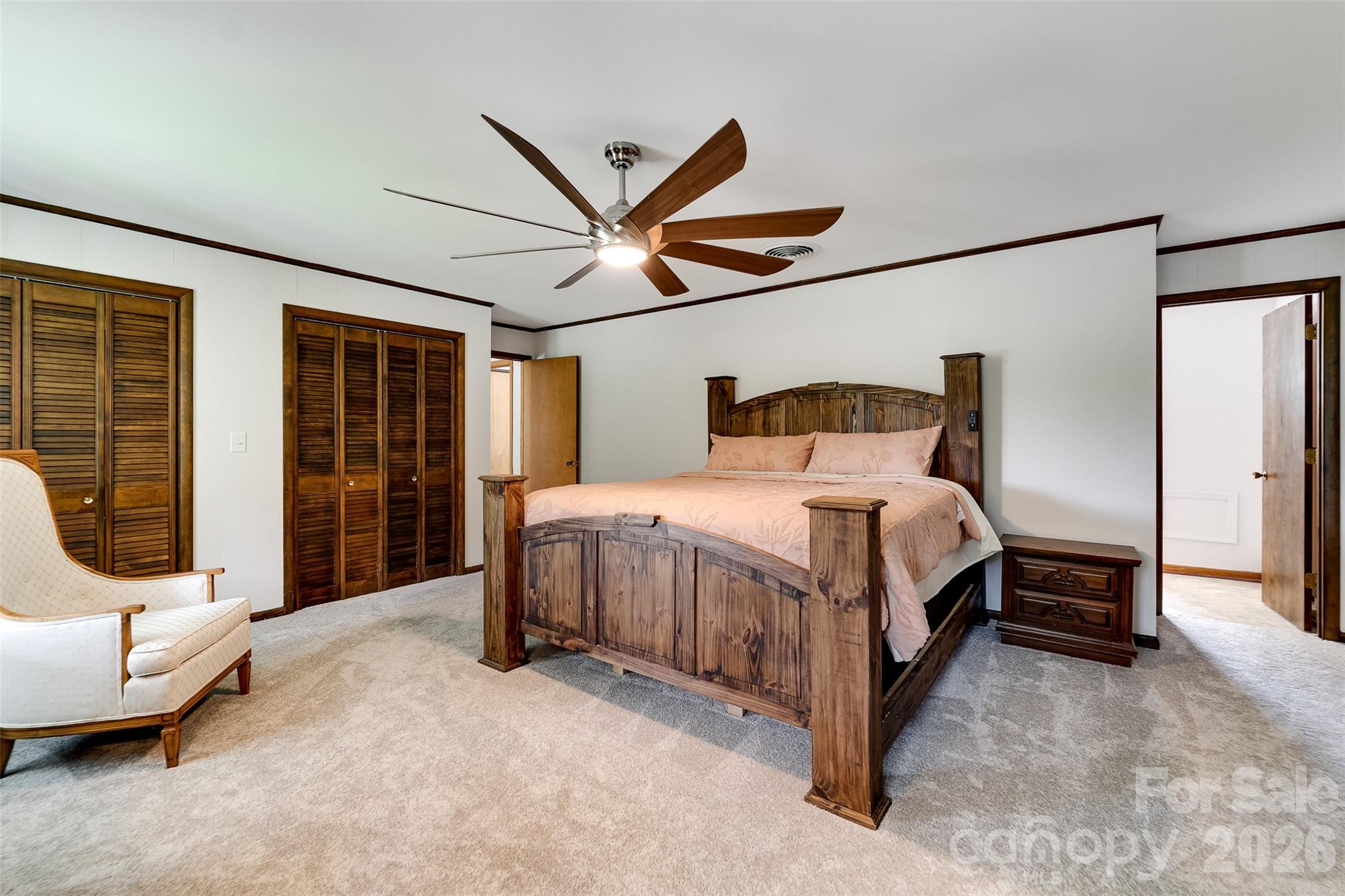 181 Fisher Crk Road Sylva, NC 28779 - Photo 28 of 48 a bedroom with a bed and a large window