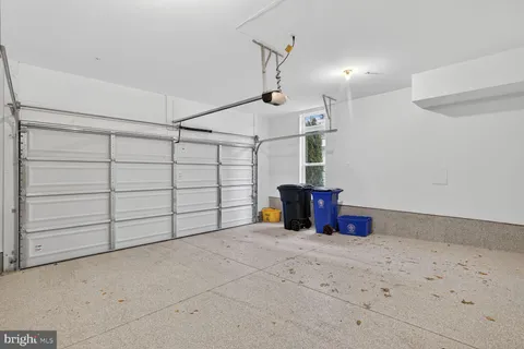 a view of path along with retail shop and buildings