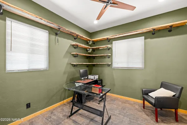 a room with furniture and a window