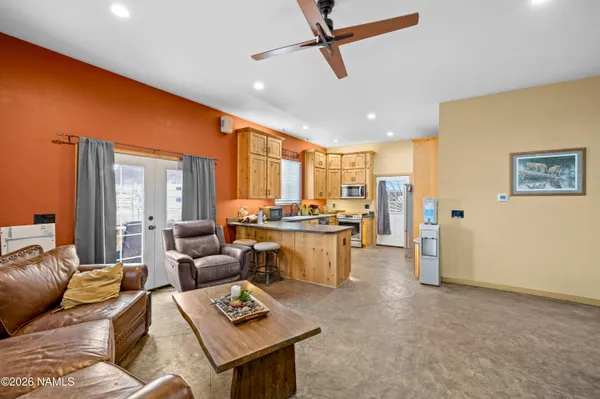a living room with furniture and a window