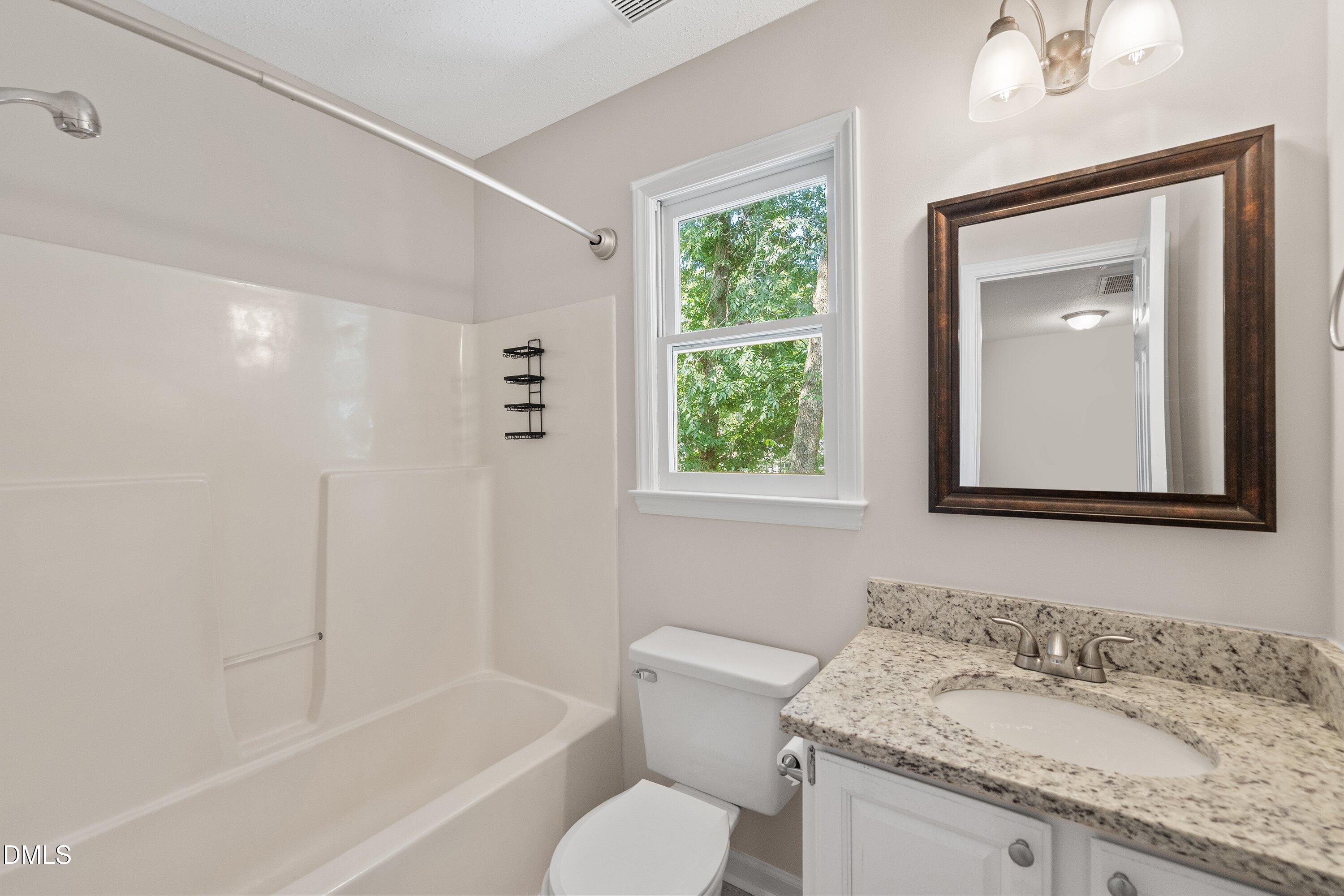 4713 Draper Road Raleigh, NC 27616 - Photo 25 of 39 Full Bathroom in the Hall