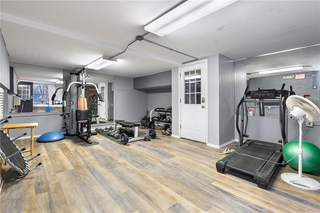 2232 Dunseath Avenue Northwest, Unit 309 Atlanta, GA 30318 - Photo 16 of 25 a view of a room with gym equipment