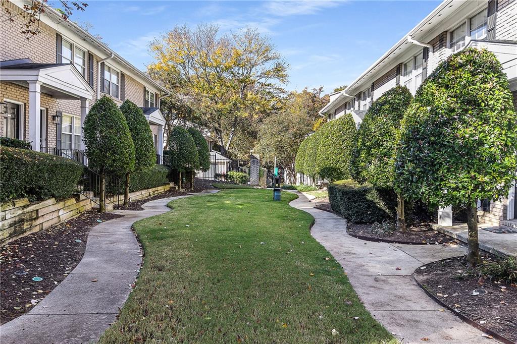 2232 Dunseath Avenue Northwest, Unit 309 Atlanta, GA 30318 - Photo 22 of 25 a view of a yard with plants and trees