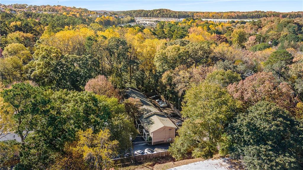 2232 Dunseath Avenue Northwest, Unit 309 Atlanta, GA 30318 - Photo 25 of 25 an aerial view of residential houses with outdoor space and trees