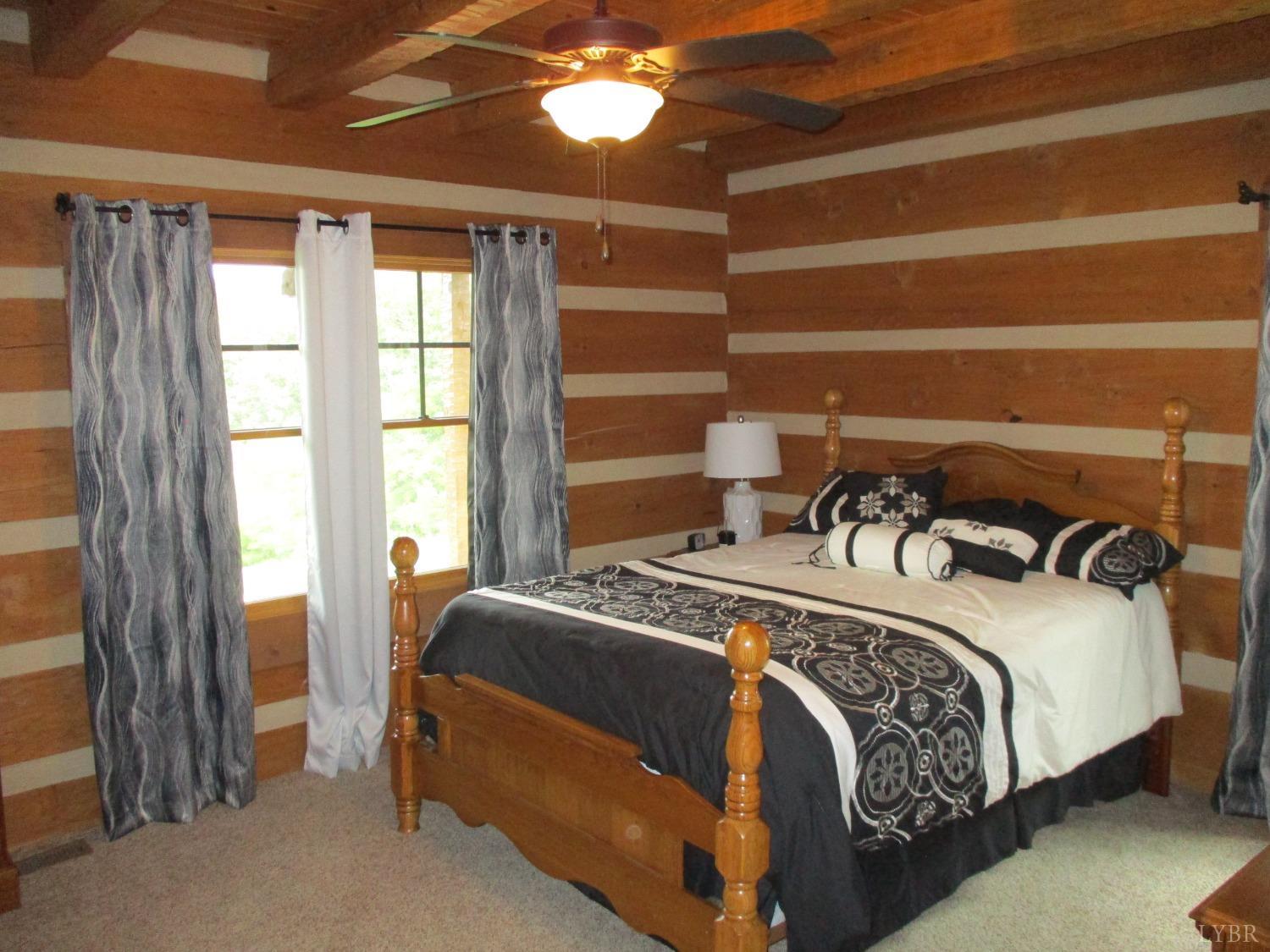 3804 Saunders Road Vinton, VA 24179 - Photo 17 of 50 a bedroom with a bed and a window