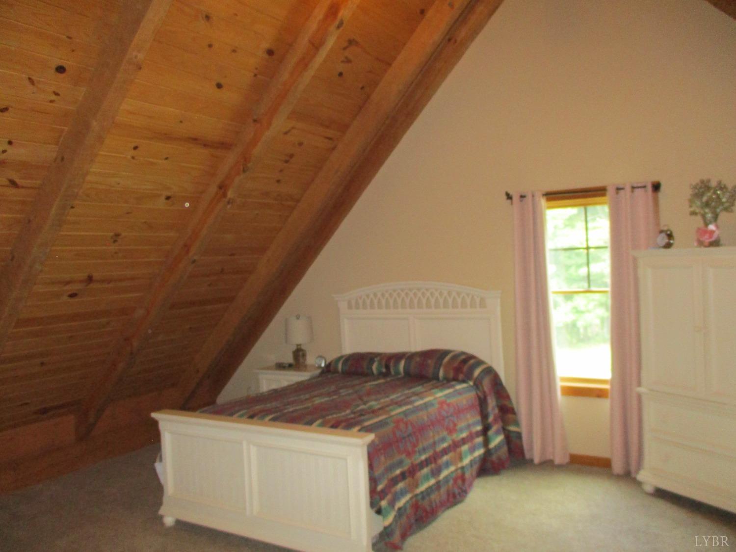 3804 Saunders Road Vinton, VA 24179 - Photo 28 of 50 a bedroom with a bed and a window