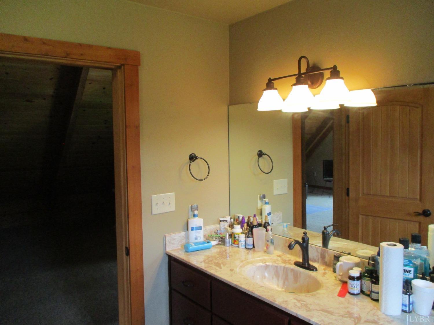 3804 Saunders Road Vinton, VA 24179 - Photo 34 of 50 a bathroom with a sink and a mirror