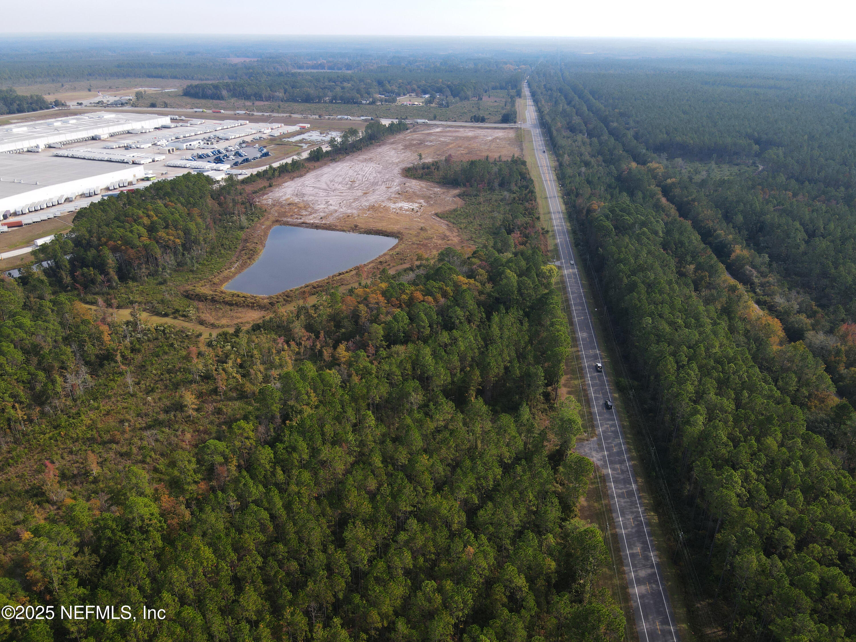 90 Highway 90 Macclenny, FL 32063 - Photo 7 of 12 an aerial view of residential houses with outdoor space
