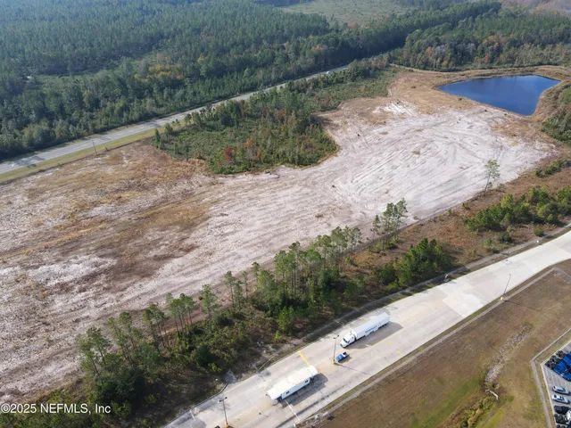 a view of a road with a yard
