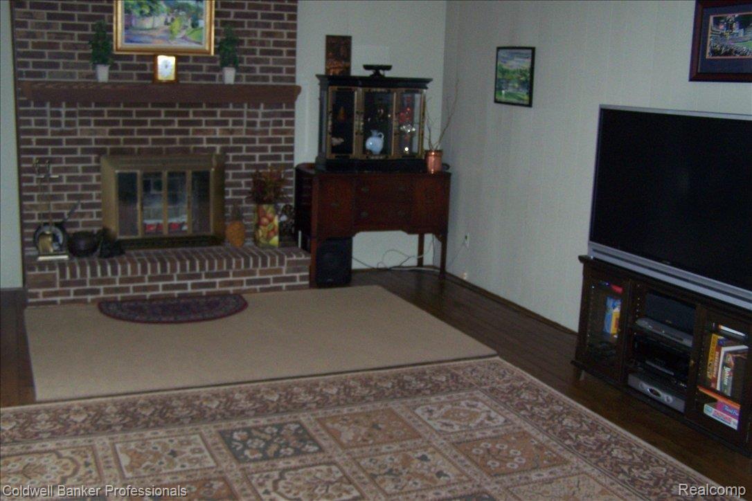 46700 Strathmore Road Plymouth, MI 48170 - Photo 6 of 21 LIVING ROOM WITH FIREPLACE