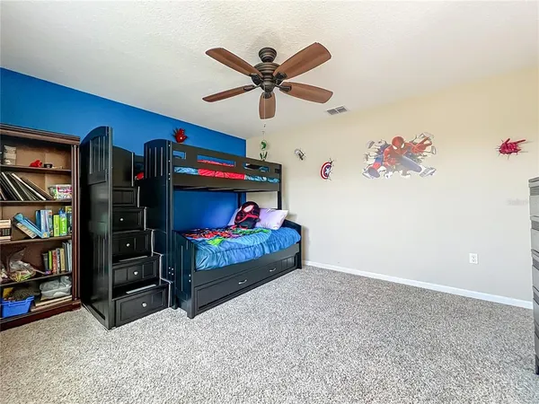 a bedroom with a bed and closet