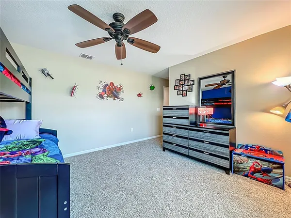 a room with toys and a chandelier