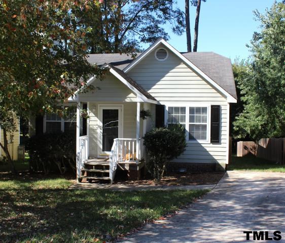 1045 Mills Street Raleigh, NC 27608 - Photo 1 of 20 a front view of house with yard and green space