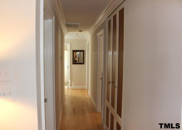 1045 Mills Street Raleigh, NC 27608 - Photo 9 of 20 a view of a bathroom from a hallway