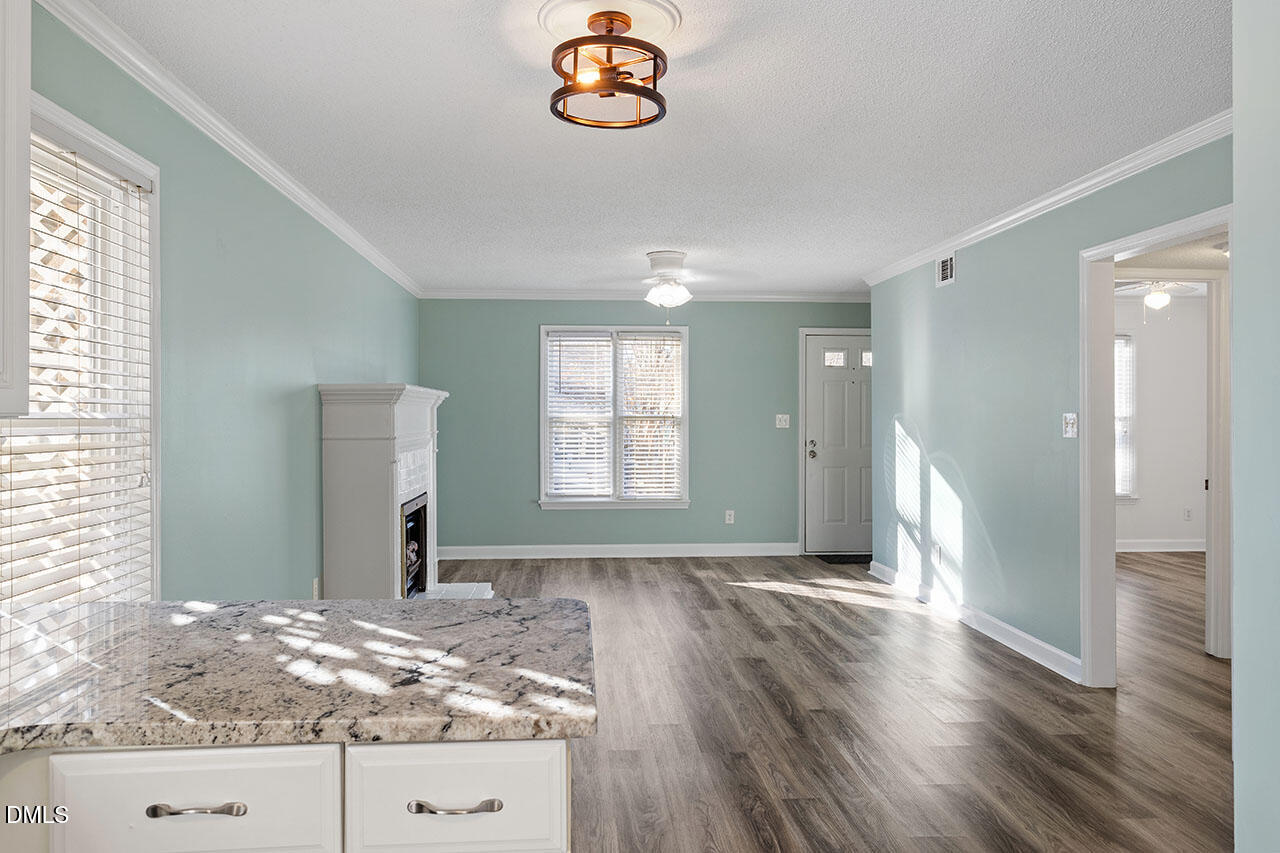 2306 Stafford Avenue, Unit D Raleigh, NC 27607 - Photo 13 of 24 a view of a livingroom with wooden floor and window