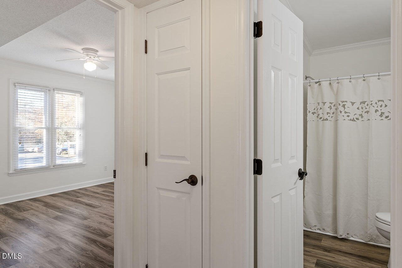 2306 Stafford Avenue, Unit D Raleigh, NC 27607 - Photo 15 of 24 a view of a bathroom with wooden floor