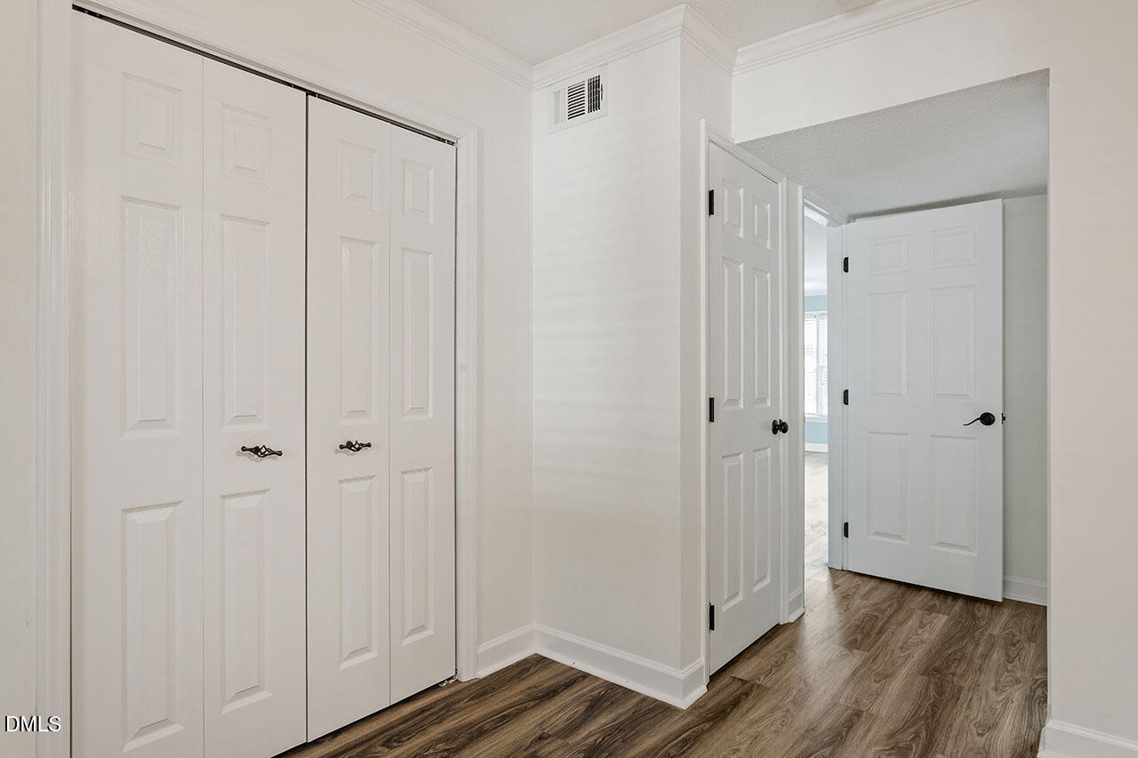 2306 Stafford Avenue, Unit D Raleigh, NC 27607 - Photo 20 of 24 a view of a bathroom with wooden floor