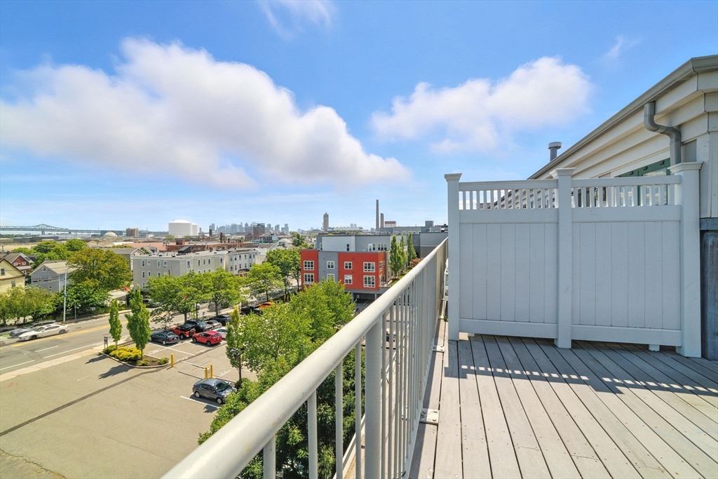 210 Broadway, Unit 406 Everett, MA 02149 - Photo 19 of 33 a view of a balcony with city view