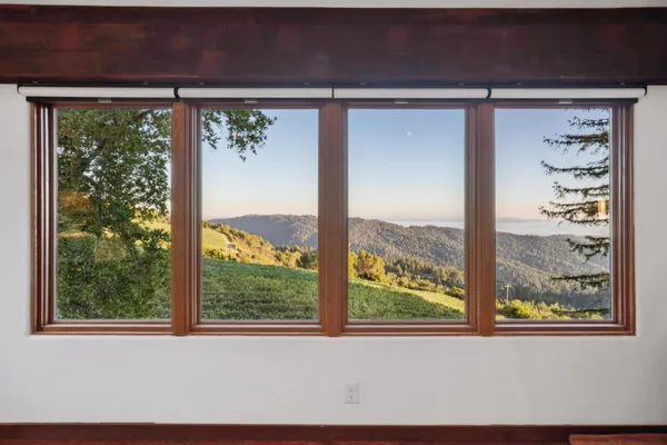 a view of a large window with a garden view