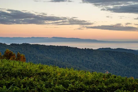 a view of lake and mountain
