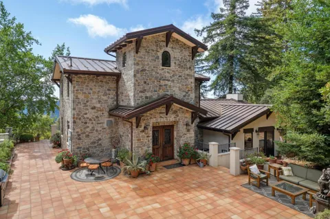 a front view of a house with patio