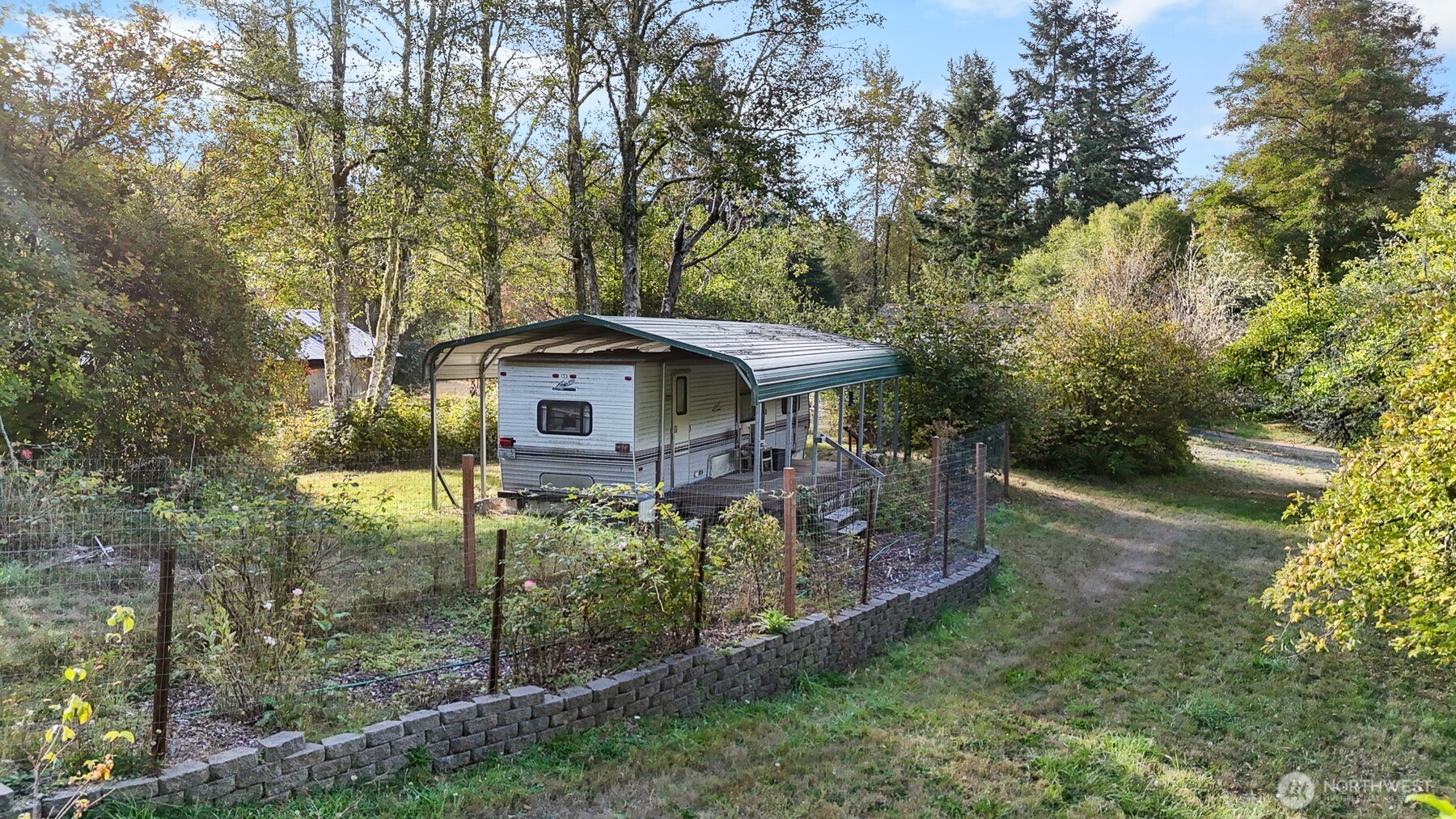 14440 Vantine Road Southeast Tenino, WA 98589 - Photo 2 of 18 a backyard of a house with lots of green space