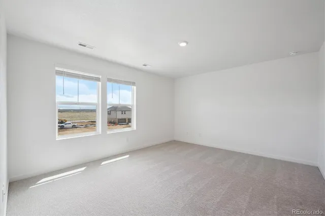 an empty room with a window