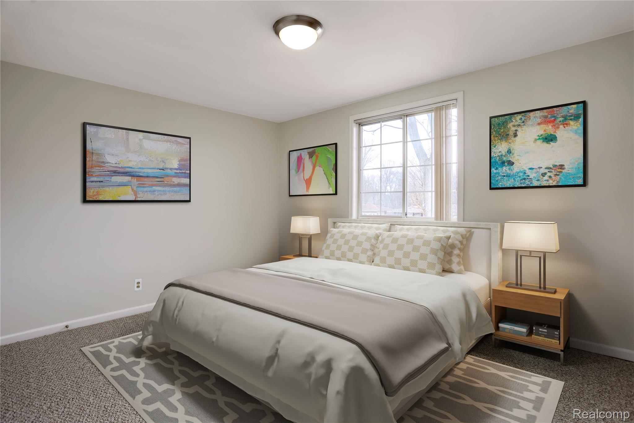 1898 Maple Road East Birmingham, MI 48009 - Photo 9 of 10 Carpeted room featuring a large window with white trim, a flush mount ceiling light fixture, and light gray painted walls