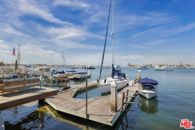 a table and chairs sitting in the roof deck