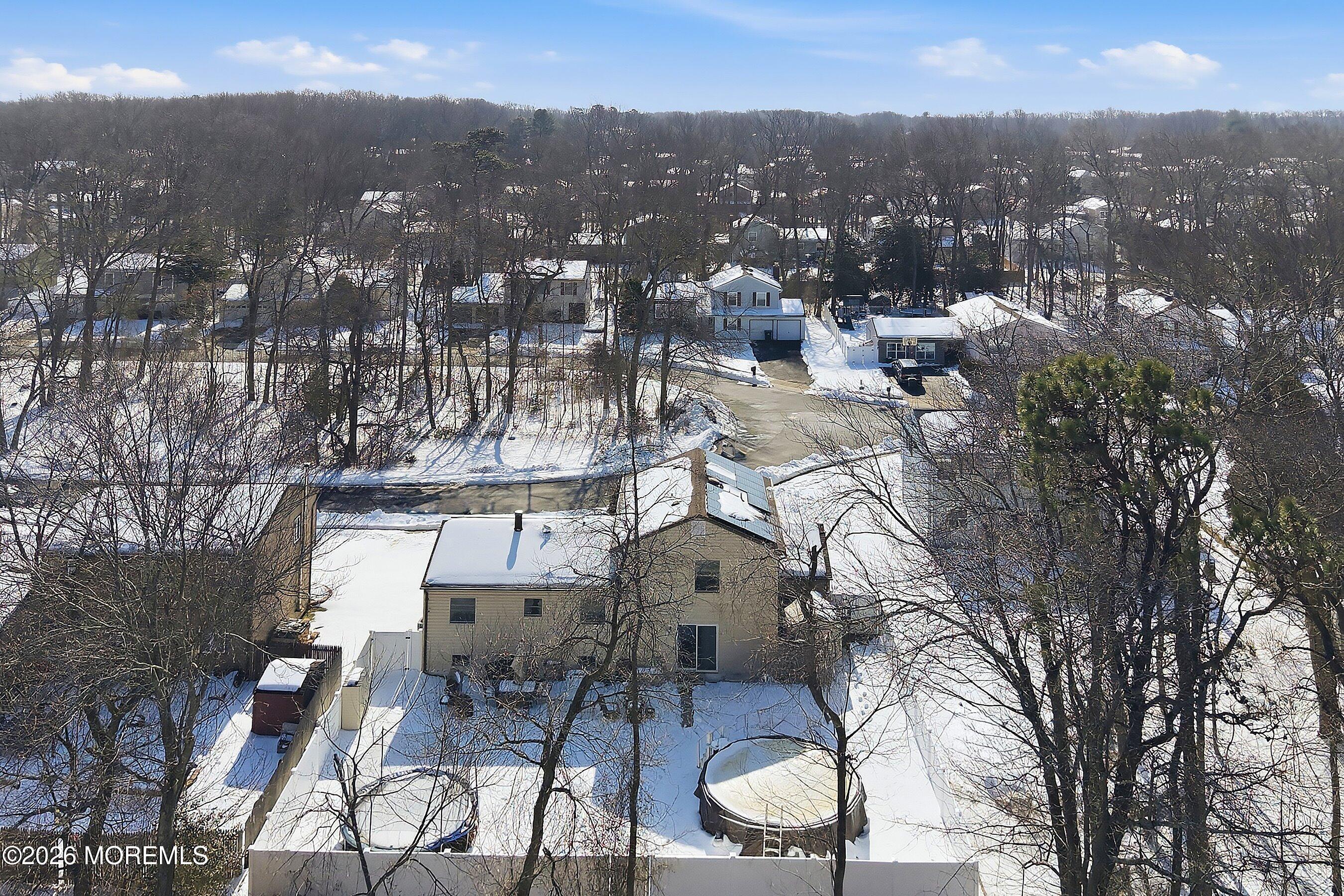 7 Colonial Court Howell, NJ 07731 - Photo 29 of 36 a view of city with tall buildings