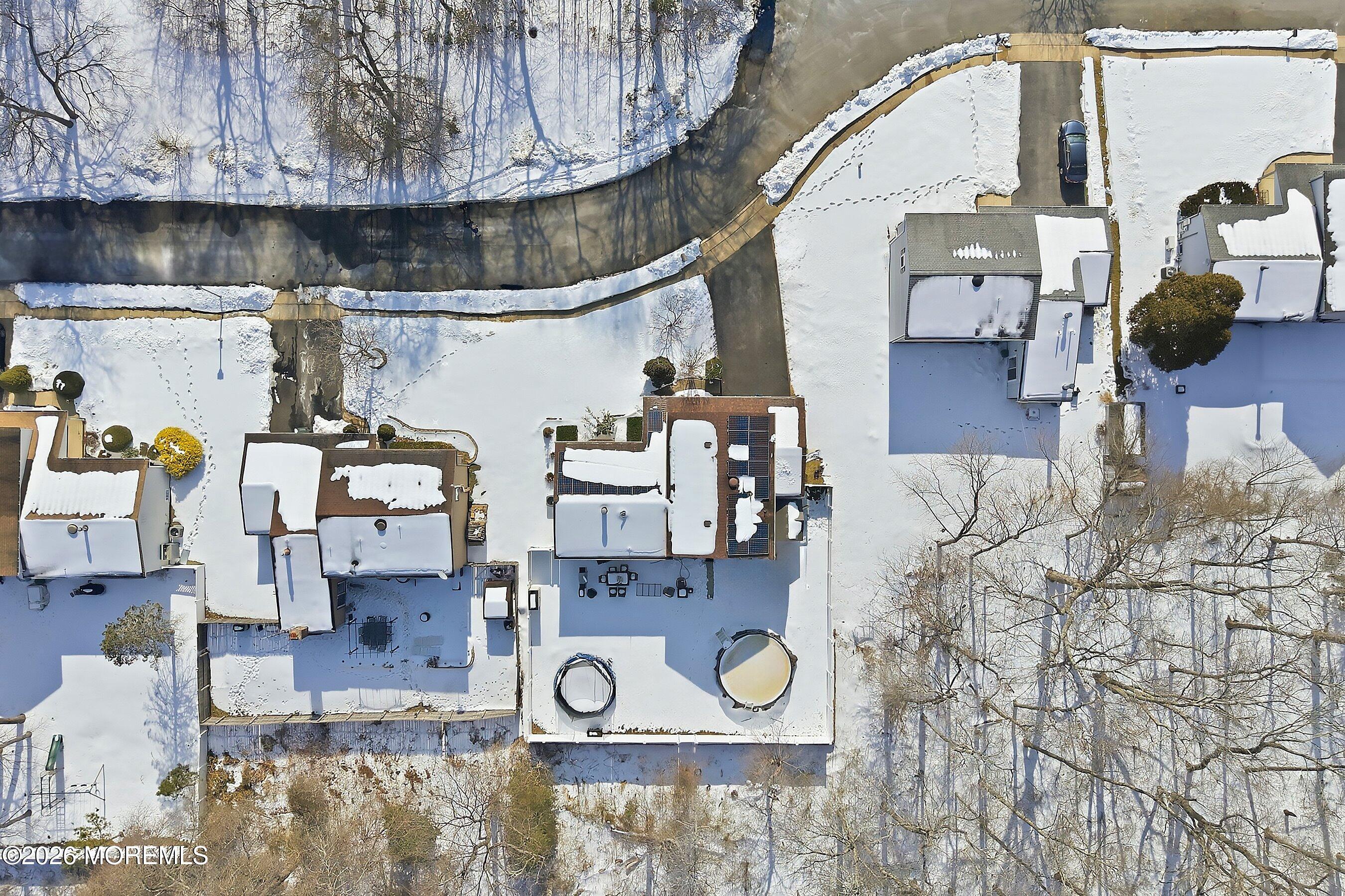 7 Colonial Court Howell, NJ 07731 - Photo 30 of 36 a living room with couches and kitchen view with wooden floor