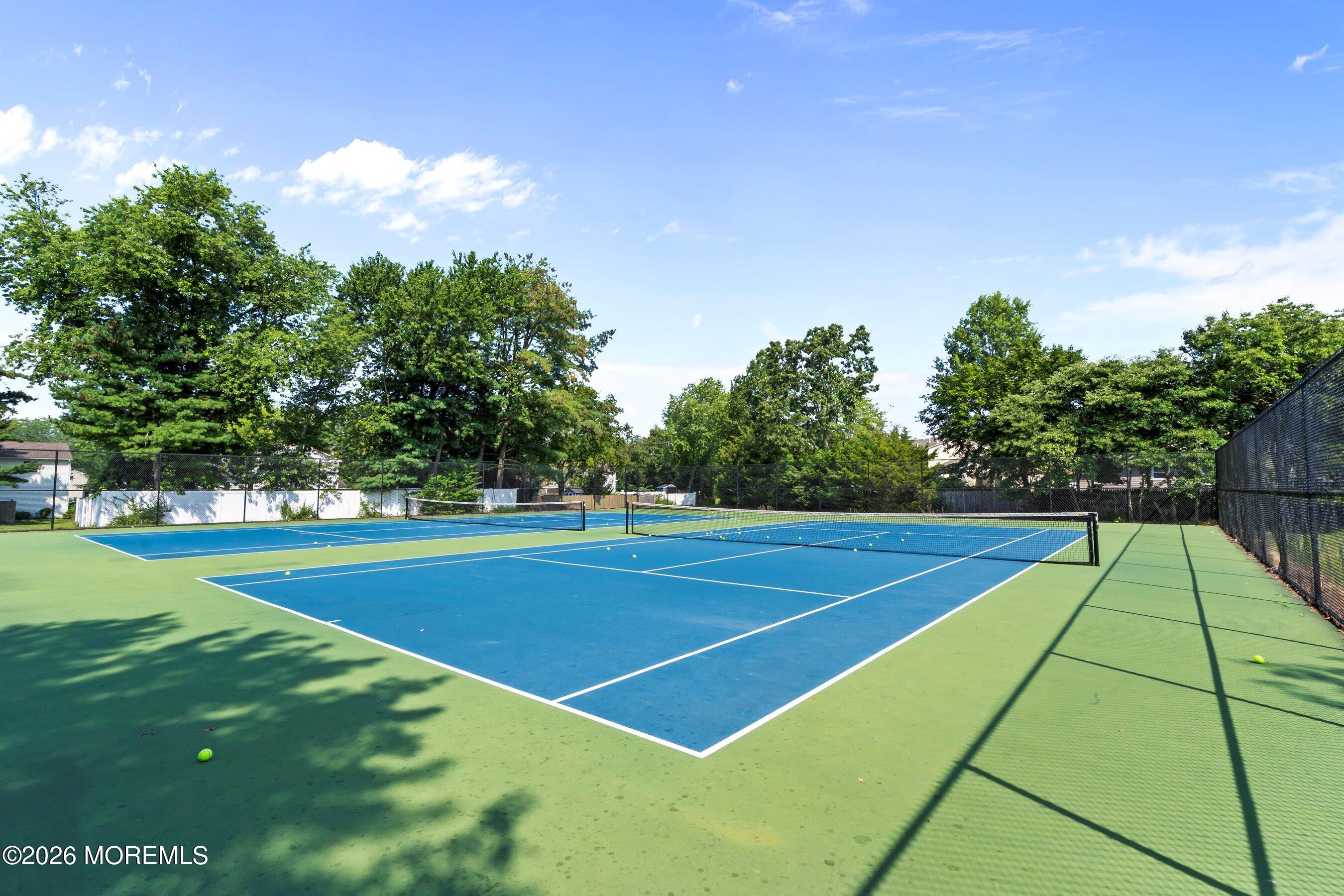 7 Colonial Court Howell, NJ 07731 - Photo 34 of 36 a view of a tennis court
