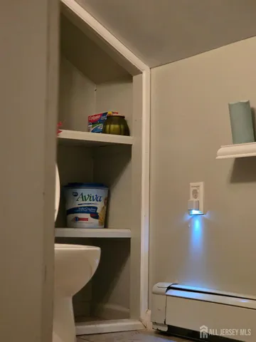 a room with furniture and gym equipment