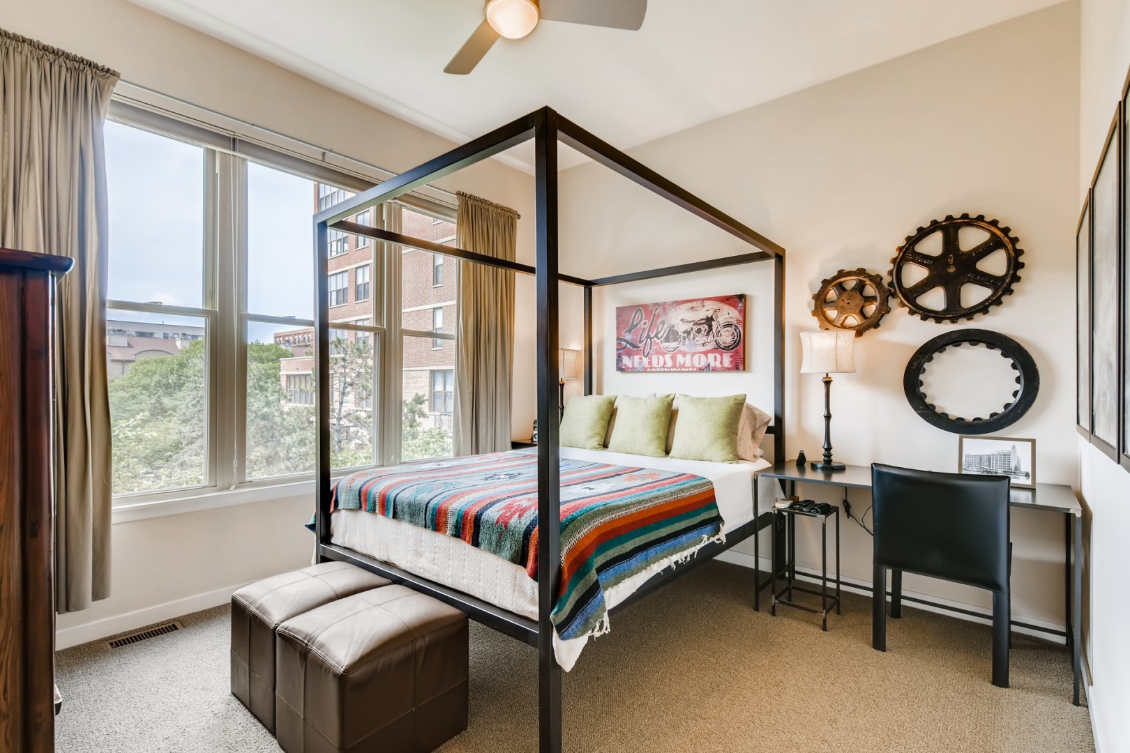 1244 West Monroe Street, Unit 5 Chicago, IL 60607 - Photo 13 of 21 a bedroom with a bed table chair and a large window