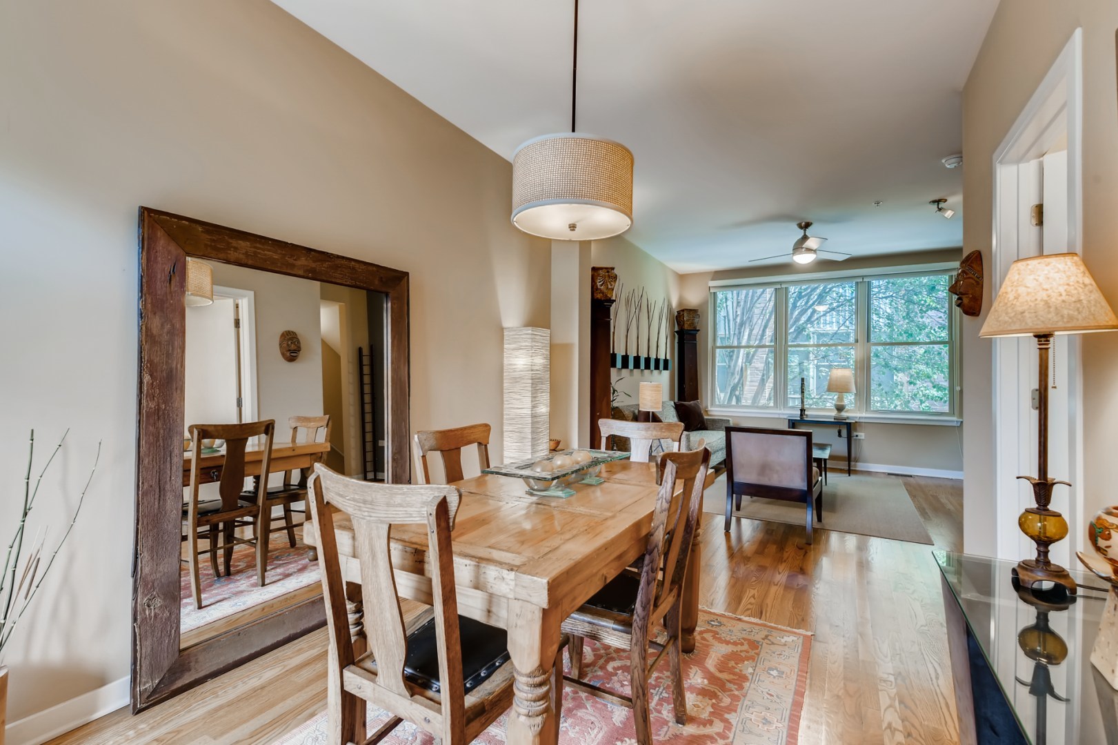 1244 West Monroe Street, Unit 5 Chicago, IL 60607 - Photo 7 of 21 a view of a dining room with furniture window and wooden floor