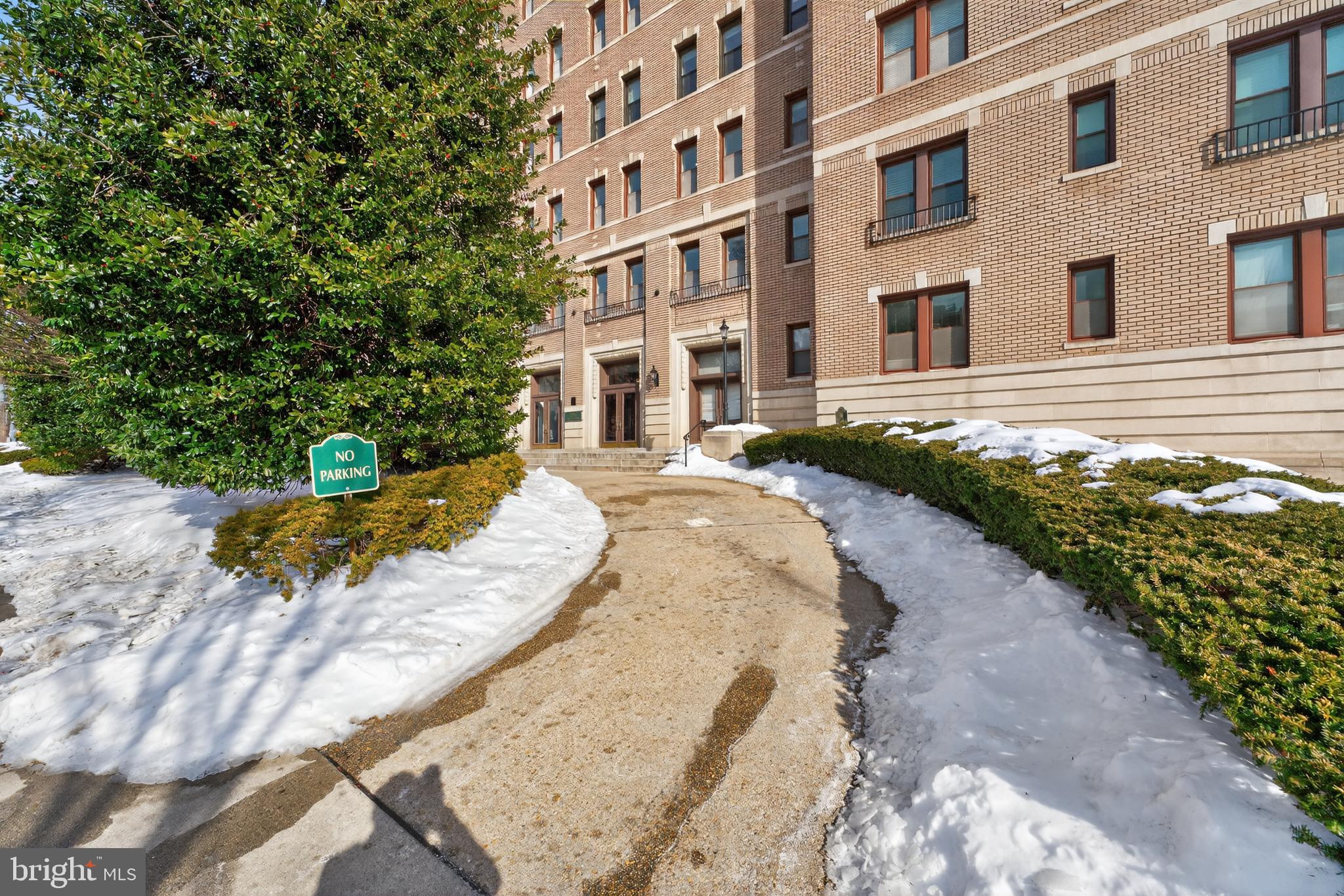2001 16th Street Northwest, Unit 307 Washington, DC 20009 - Photo 19 of 29 a view of a building with a yard