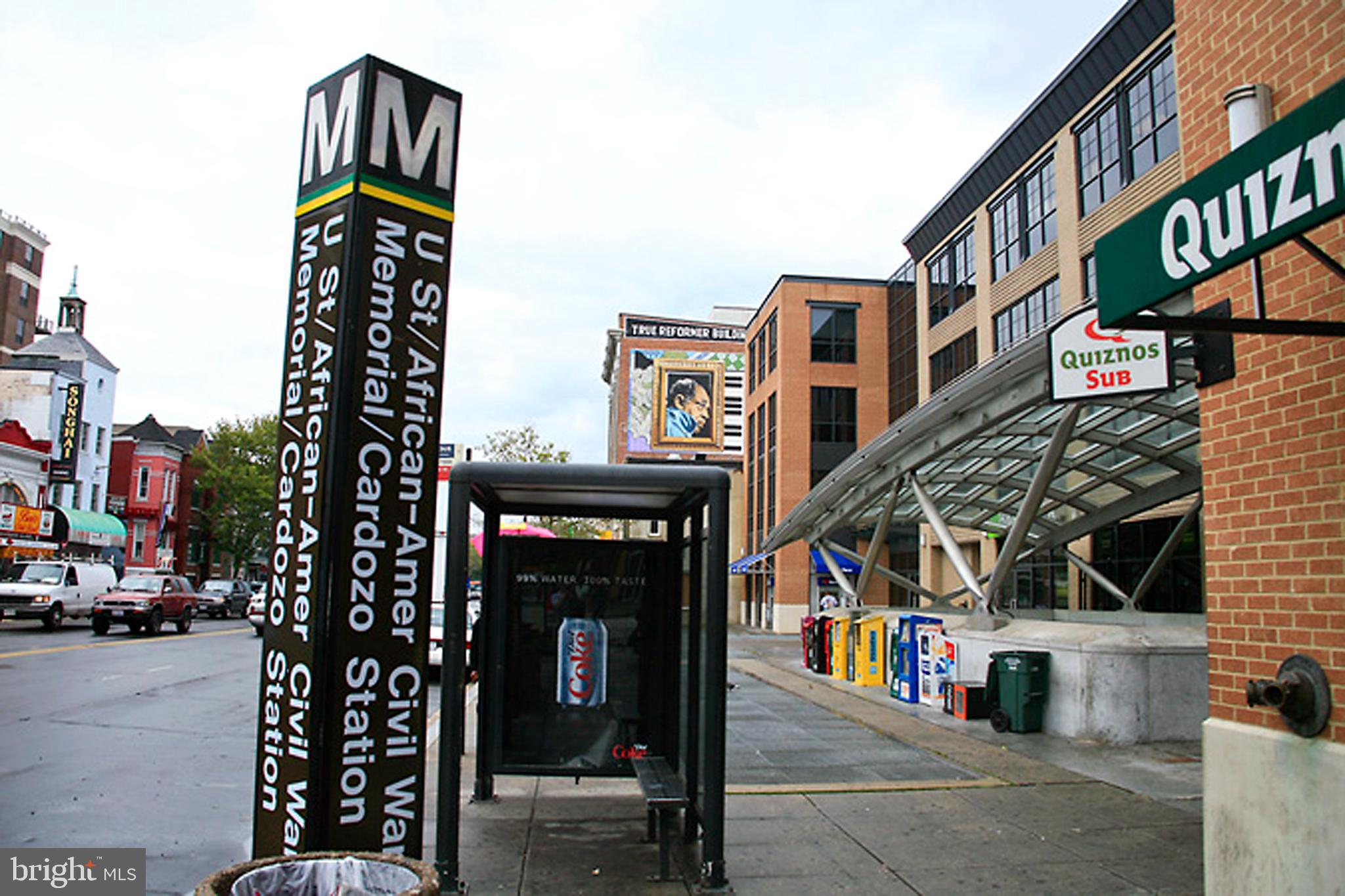 2001 16th Street Northwest, Unit 307 Washington, DC 20009 - Photo 21 of 27 a front view of a building with retail shops