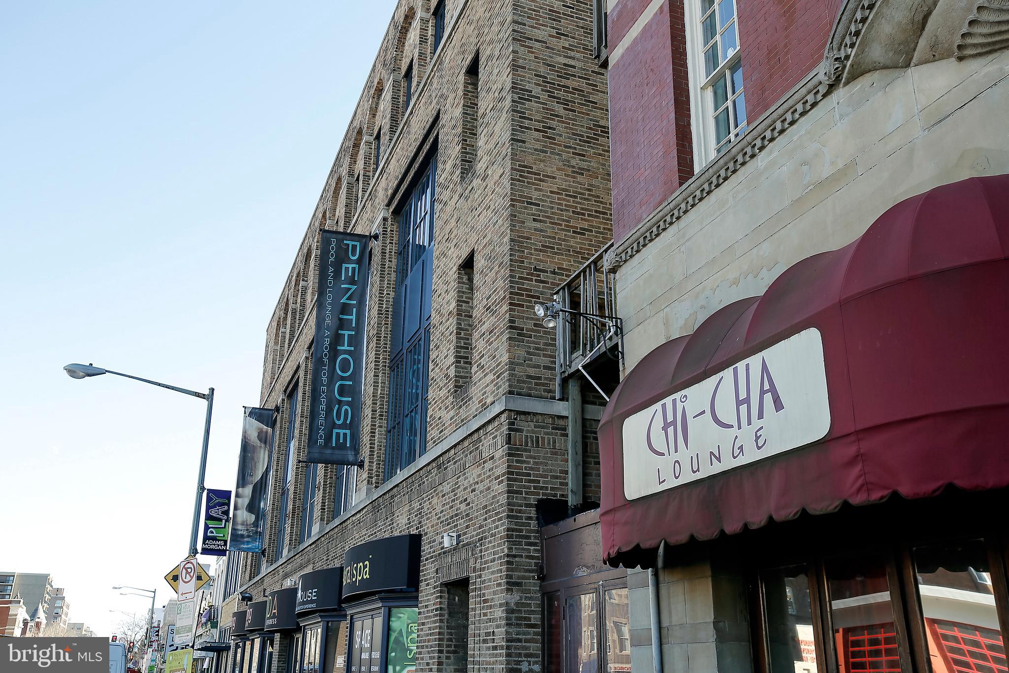 2001 16th Street Northwest, Unit 307 Washington, DC 20009 - Photo 23 of 27 a sign on a pole on a street