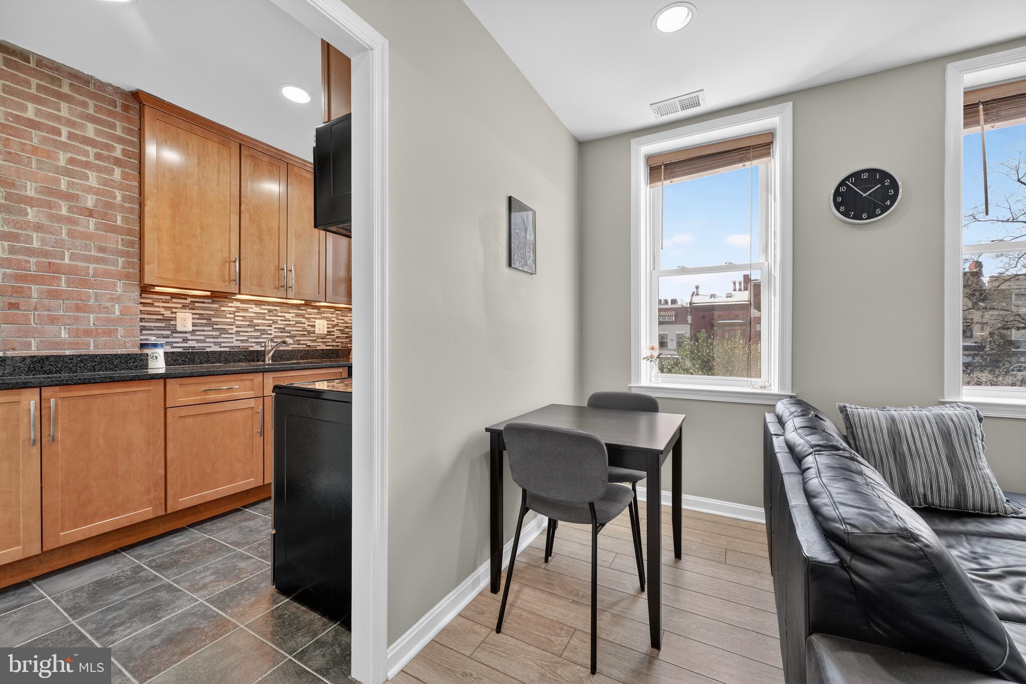 2001 16th Street Northwest, Unit 307 Washington, DC 20009 - Photo 7 of 27 a view of kitchen with breakfast area