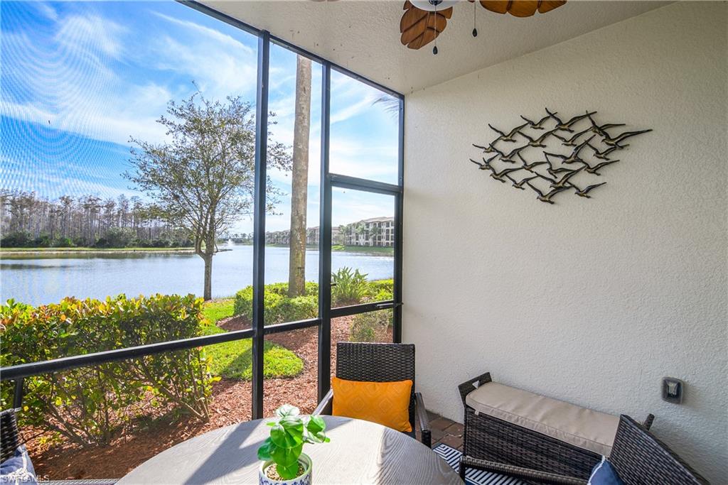 9560 Trevi Court, Unit 4811 Naples, FL 34113 - Photo 19 of 40 a view of a balcony with chairs