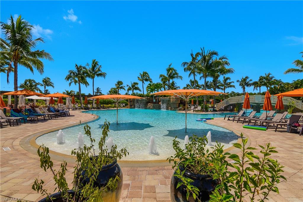 9560 Trevi Court, Unit 4811 Naples, FL 34113 - Photo 28 of 40 a view of a swimming pool and a chair