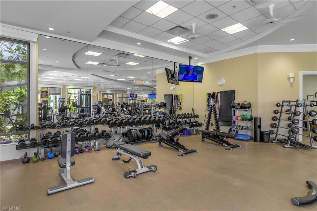 9560 Trevi Court, Unit 4811 Naples, FL 34113 - Photo 33 of 40 a view of a room with gym equipment