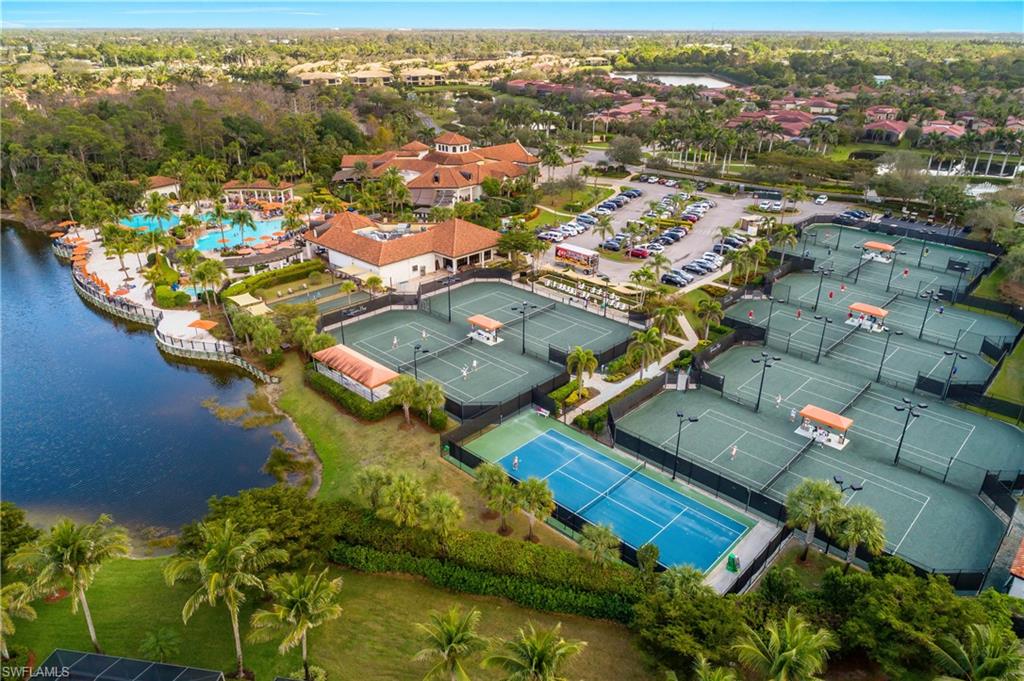 9560 Trevi Court, Unit 4811 Naples, FL 34113 - Photo 37 of 40 an aerial view of residential houses with outdoor space